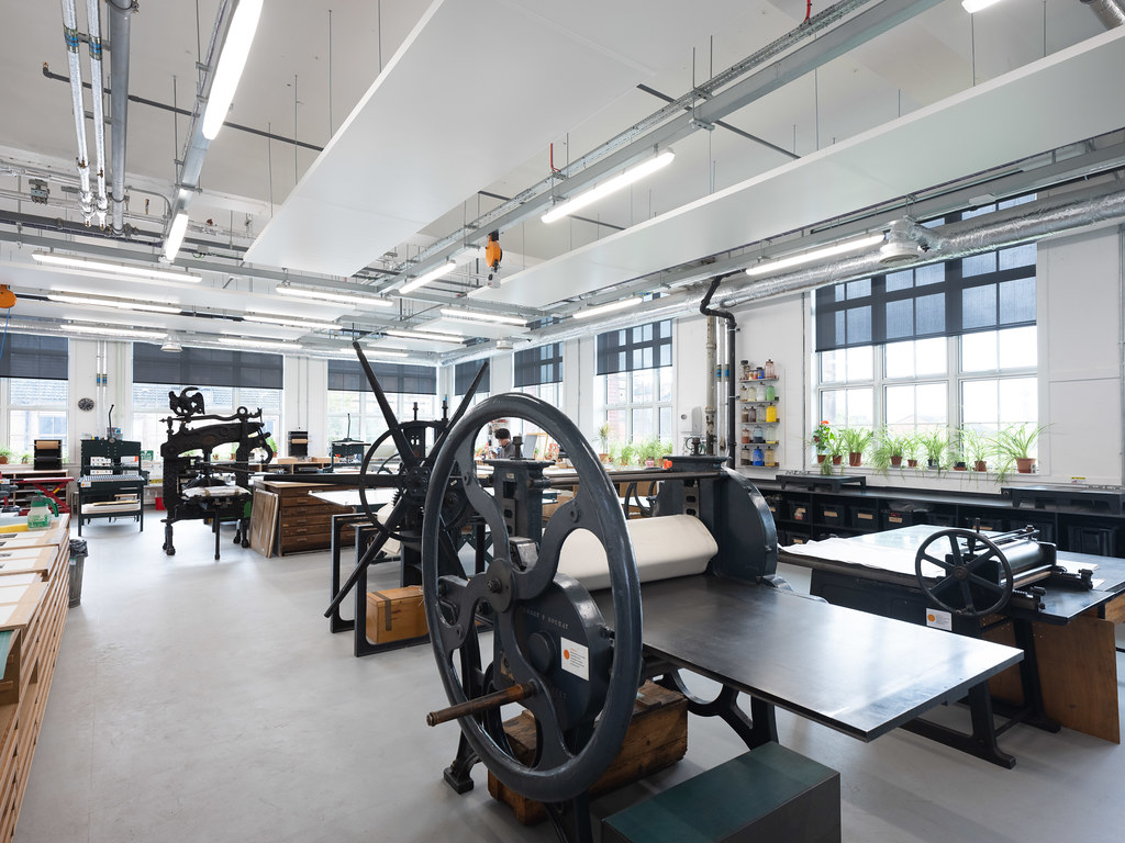 Printmaking workshop with presses and worktables